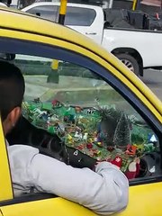 Taxi Driver Creates Complex Nativity Scene on Dashboard
