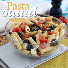 Pasta salad with tomato, feta cheese, and olives