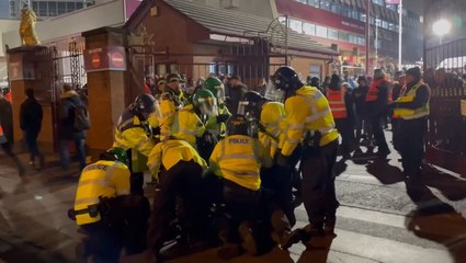 Legia Warsaw fans throw missiles at police officers in violent clash at Villa Park