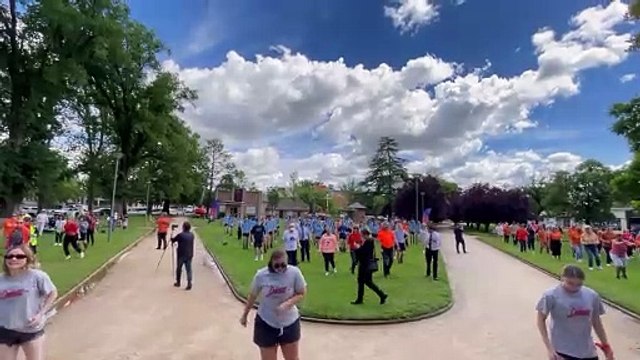 Large crowd performs Nutbush in Orange for domestic violence awareness