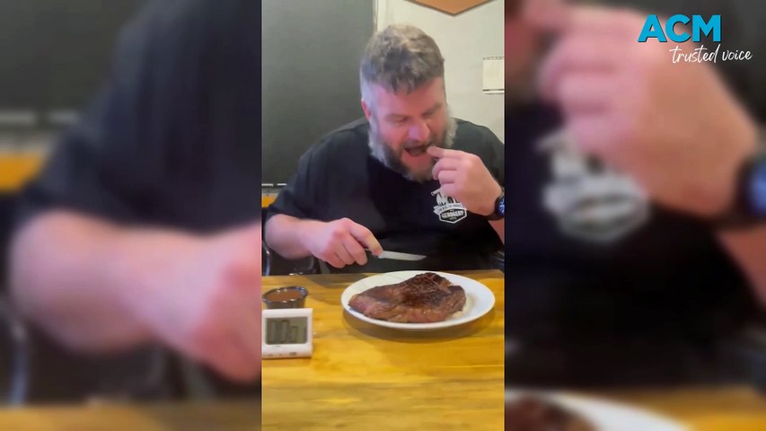Publican Norm Carl powers through the 1KG steak in two minutes