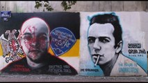 La battaglia per l'anima della Serbia sui murales di Belgrado