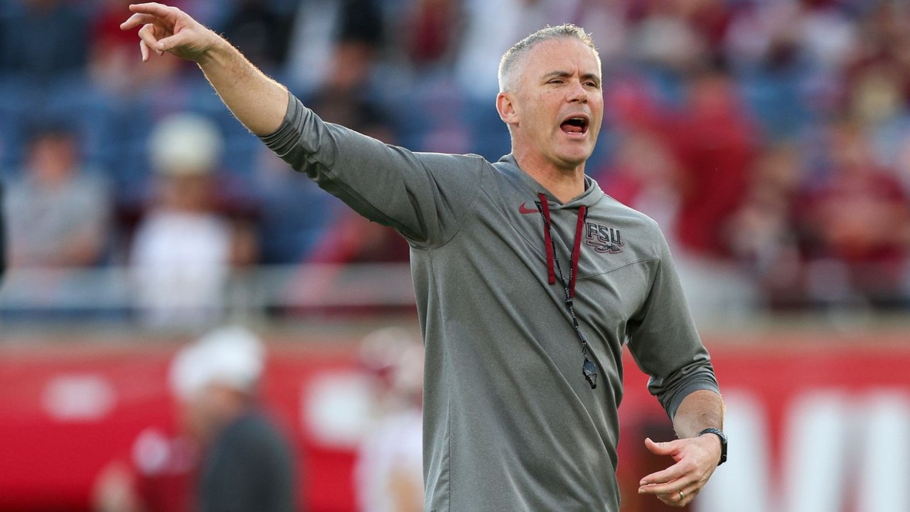 ACC Championship: Louisville vs .FSU in Rain with High Stakes