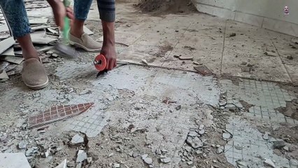 Removing_ceramic_floor_to_install_new_ceramic_in_its_place(1080p)