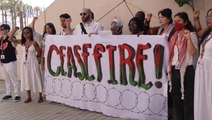 Cop28 protesters read out names of Palestinians killed in Israel-Hamas war