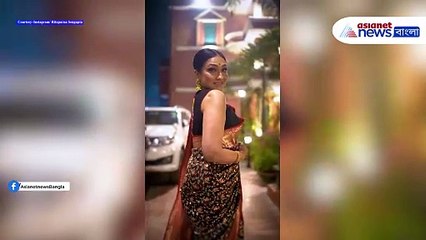 কালো স্লিভলেস ব্লাউজে আগুন ধরালেন ঋতুপর্ণা