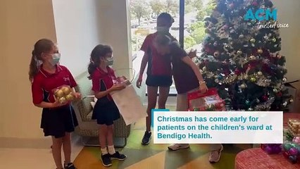 Epsom students spread the Christmas cheer to hospital's children's ward