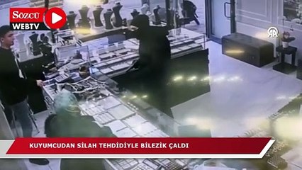 Video herunterladen: Kuyumcudan silah tehdidiyle bilezik çalan maskeli gaspçı yakalandı