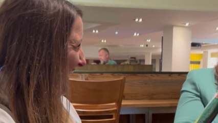 Lively ladies swap silly hats before embarking on fun-filled day trip to Manchester