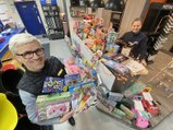 Lee Dees, from MKM Building Supplies, thanks donors for supporting the Mail-backed Christmas presents appeal