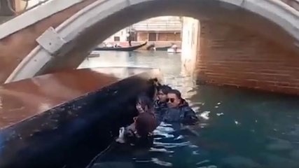 Selfie-taking tourists capsize gondola in Venice canal