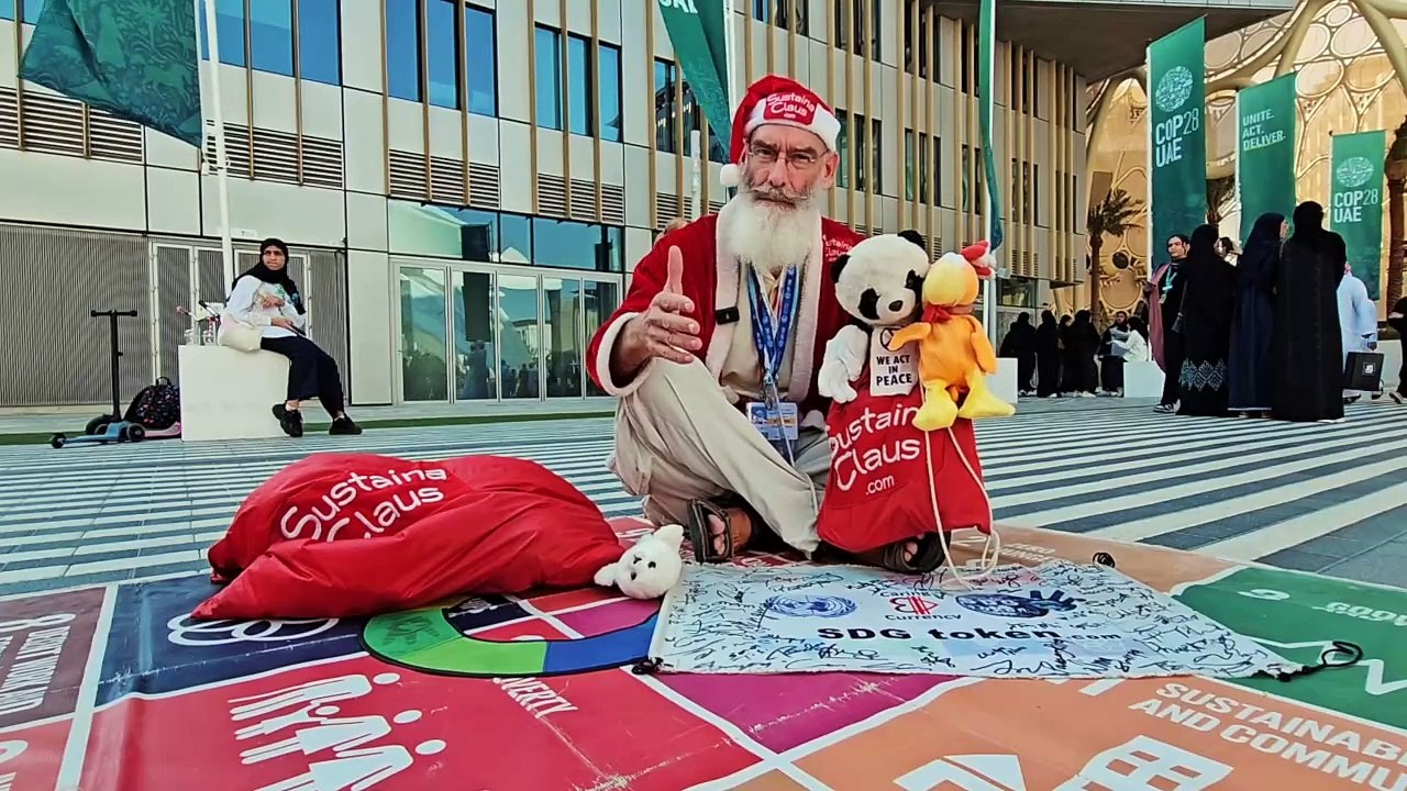 Philip McMaster: This Santa Claus spreads joy at COP28, advocating for a greener future