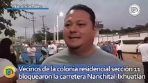 Vecinos de la colonia residencial sección 11 bloquearon la vía de comunicación Nanchital-Ixhuatlán