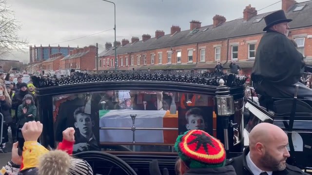 Crowds gather in Dublin to watch funeral procession of Pogues front-man Shane MacGowan