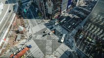 High angle view 4K time-lapse video of Ginza road intersection during the day, with crowded people.