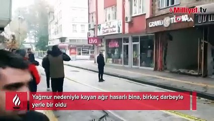 Yağmur nedeniyle kayan ağır hasarlı bina, birkaç darbeyle yerle bir oldu