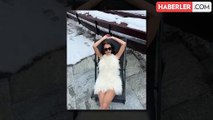 Fotoğraflara bakan üşüyor! Dilan Çiçek Deniz, dekolteli mini elbisesiyle karlar içinde poz verdi