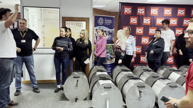 Employees at Corby’s RS give up time to build washing machines for families in need