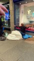 Watch: McDonald's security guard soaks homeless man's sleeping bag