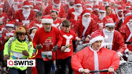 Hundreds of Santas take part in charity fun run