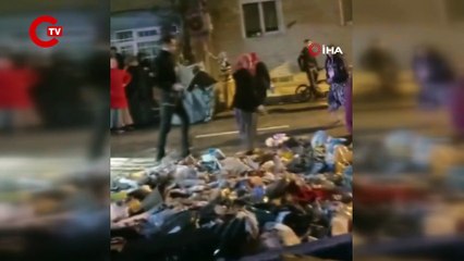 Gaziosmanpaşa’da bulunan bir zincir markette çıkan yangın nedeniyle dışarı alınan ürünleri vatandaşlar topladı