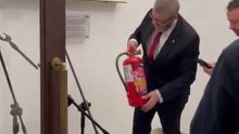 Polish MP Grzegorz Braun extinguishes Jewish Hanukkah candles at Poland's parliament.