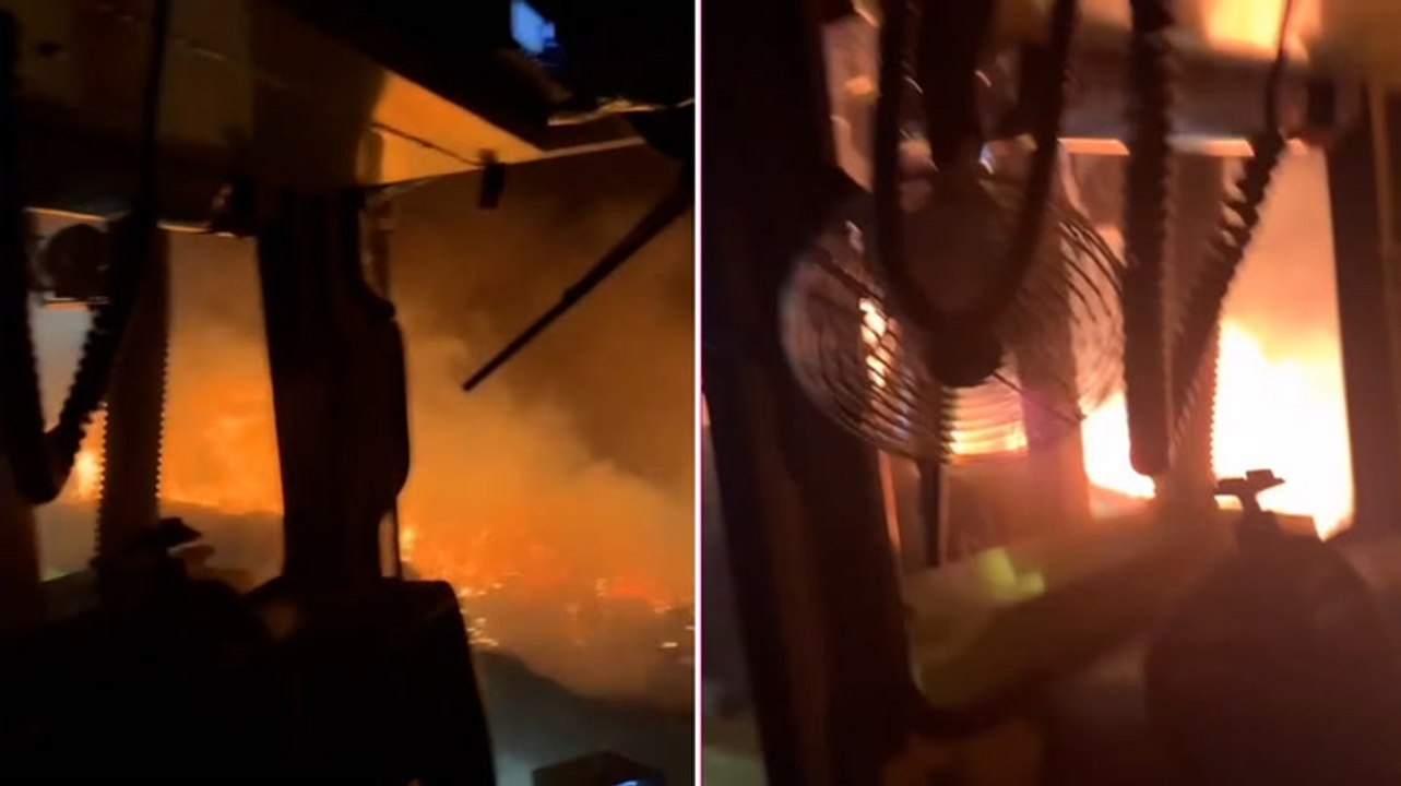 Firefighters battle through raging brush fire in California through night