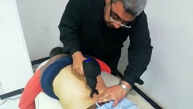 gun Massage علاج مشاكل وآلالام العمود الفقري بتقويم العمود الفري وجهاز