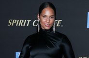 Alicia Keys has admitted growing up in the music industry inspired her decision to go makeup free