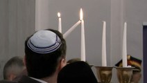 Polish parliament relights Hanukkah candles extinguished by far-right politician