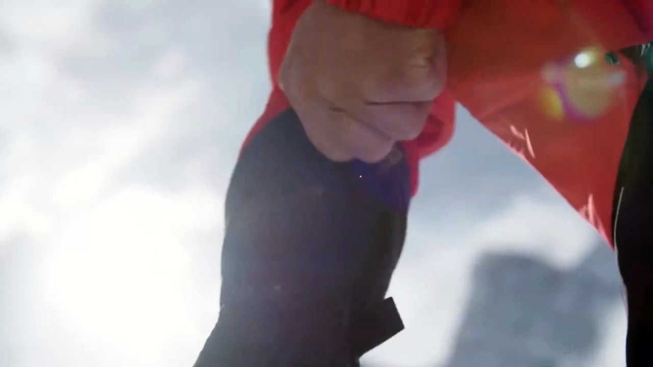 Adventure people Climbing A Snowy Mountain Ridge With Determination.