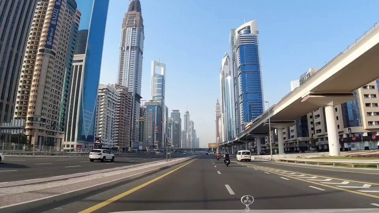 Car drive in Dubai business area.