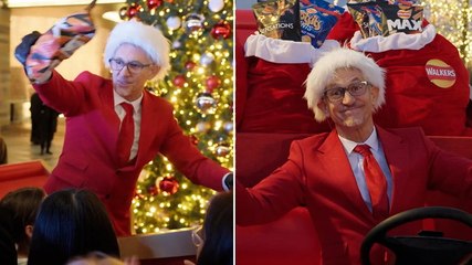 Gary Lineker poses as ‘Father Crispmas’ and hands out snacks to celebrate 30 years with Walkers