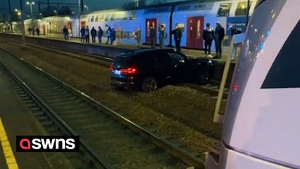 Train narrowly avoided "catastrophe" after motorist crashed car onto railway tracks