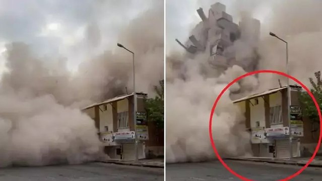 Ağır hasarlı bina yıkım sırasında yanındaki evin üzerine devrildi!