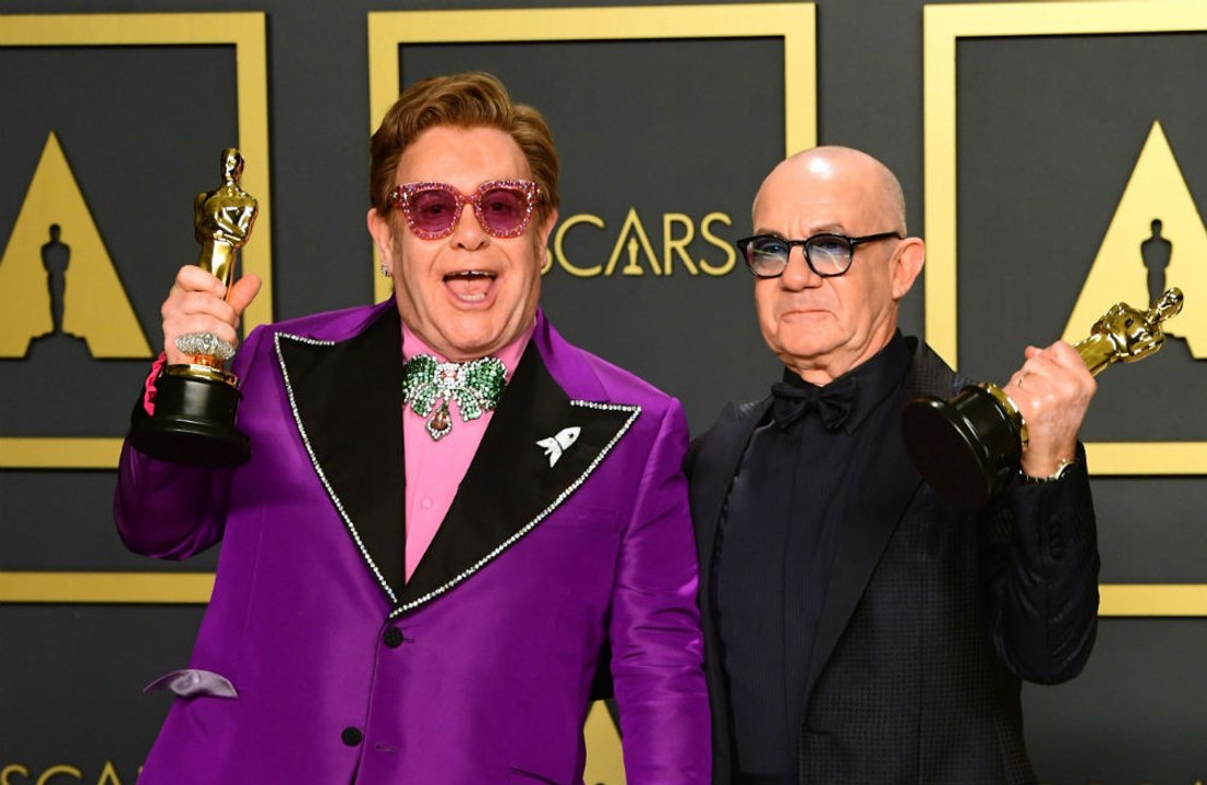 Sir Elton is "a good psychiatrist", according to longtime songwriting partner Bernie Taupin