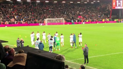 Luton Town players applaud AFC Bournemouth supporters