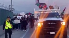Pro-Palestinian protesters block the entrance to Los Angeles International Airport