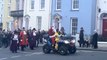 Father Christmas arriving at the seaside town of Tenby