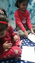 Akshu and Trishu creating doll drawing-dm