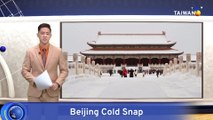 Cold Snap Blankets Beijing in Snow While South China Feels the Heat