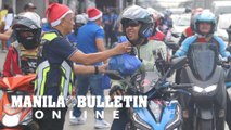 MMDA distributed gift packs to riders along EDSA