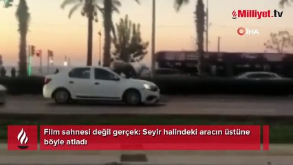 Film sahnesi değil gerçek: Seyir halindeki aracın üstüne böyle atladı