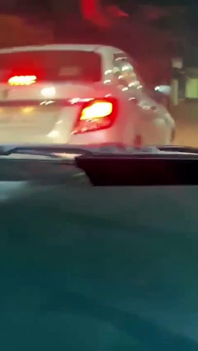 बाइक सवार को दो किमी तक खिड़की में लटकाकर गाड़ी चलाते रहे