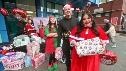 Watch: Kingswinford parents who lost their daughter to cancer dress up and bring joy to children at Birmingham Children's Hospital, with a huge delivery of presents.