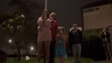 Resilient mom-to-be overwhelmed with emotion during sky-sparkling gender reveal