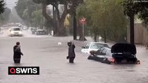 Video shows cars submerged and residents wading through floodwater in Santa Barbara