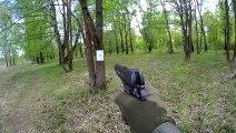 Slow Motion Shots From Airsoft Pistol Plastic Balls At A Target Outdoor