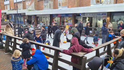 Families enjoy the new Christmas Ice Rink in Burgess Hill town centre