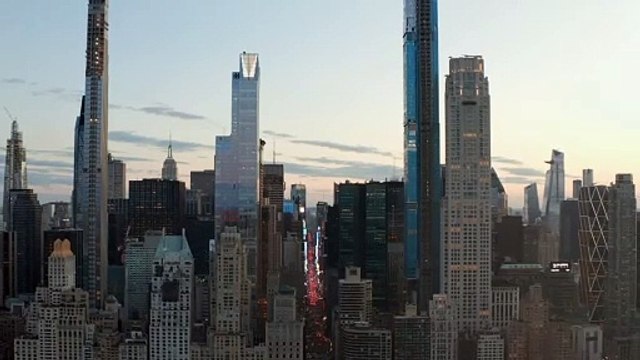 Skyscrapers and an avenue through New york city.